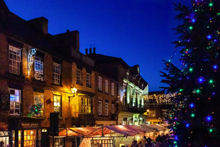Market and Christmas Tree at Night